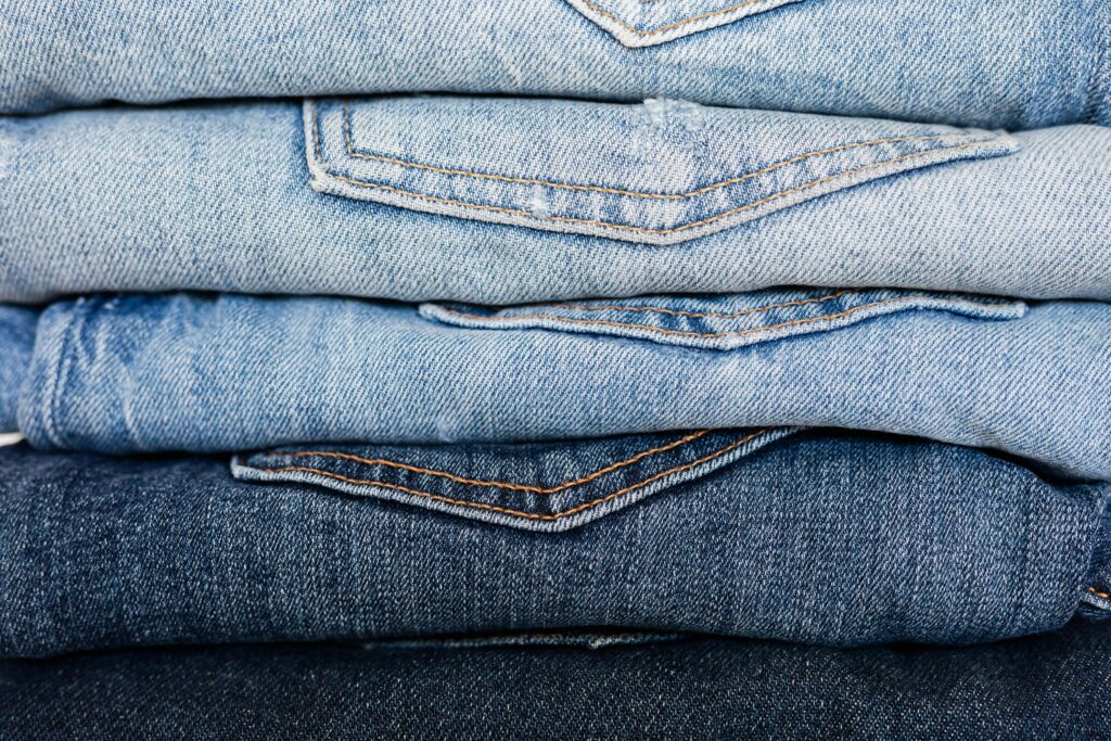 pexels-photo-4210860-4210860 Closeup of stack of blue denim pants neatly arranged according to color from lightest to darkest